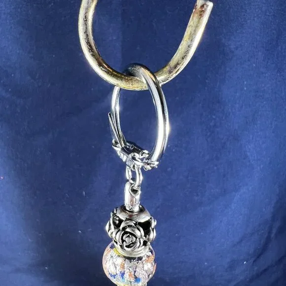 Beaded Keychain Bag Charm With Orange & White Tassels And Silver Floral Accent - Picture 4 of 4